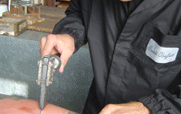 The shaping and soldering of metal pipes is entirely done by hand.