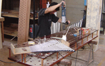 The individual fitting of each pipe on its rackboard.